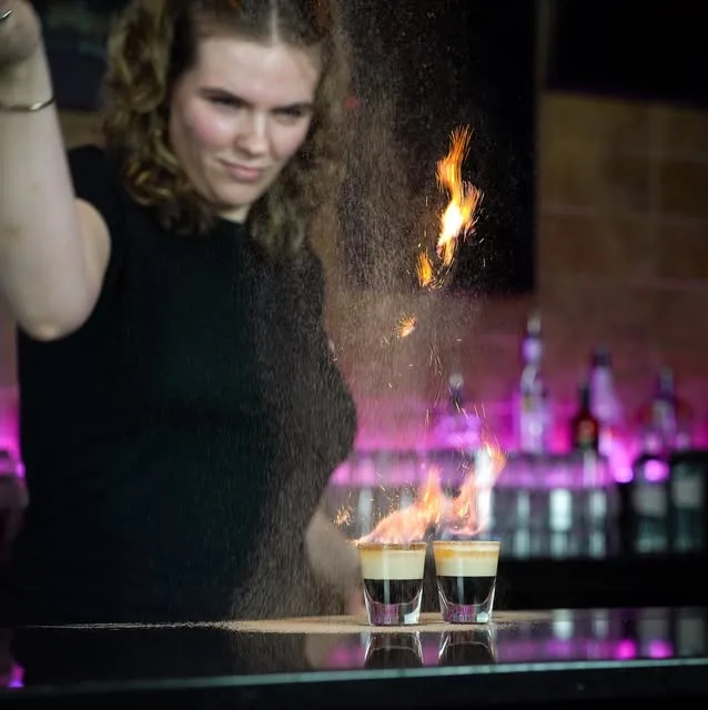 Flaming shots on a bar