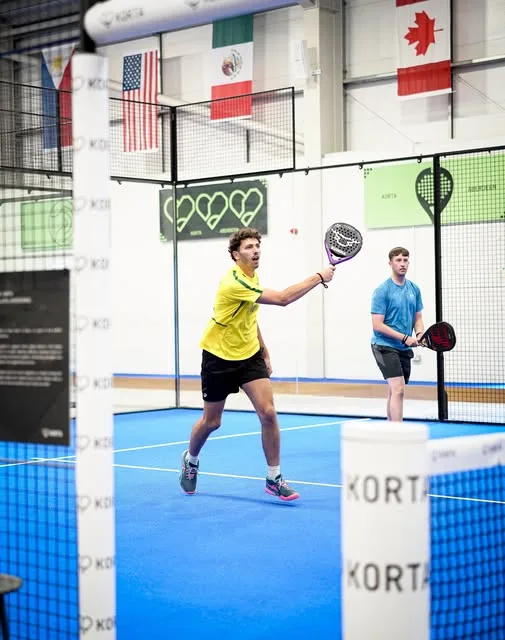 Padel players mid-rally on court at KORTA Aberdeen